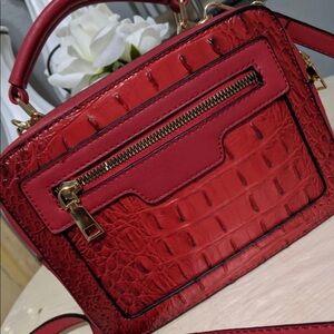 Red Faux Leather and Gold Hardware Handbag